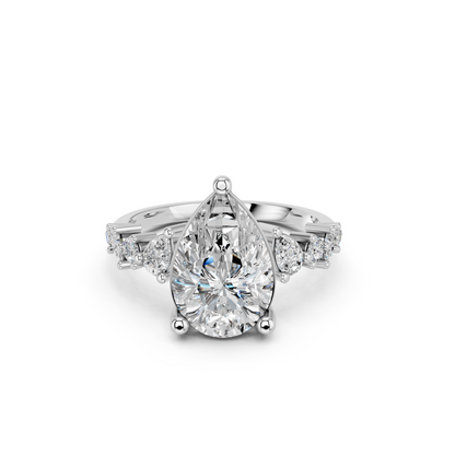 PEAR ENGAGEMENT RING WITH SIDE STONE