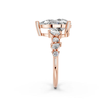 PEAR ENGAGEMENT RING WITH SIDE STONE