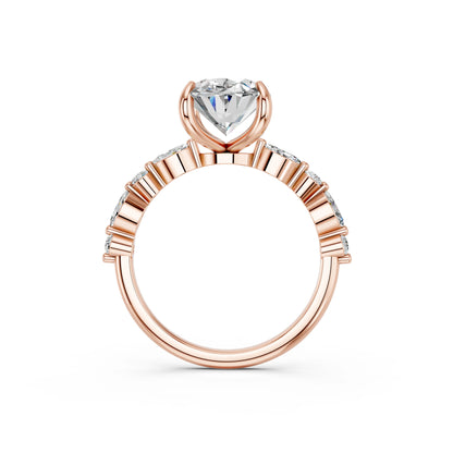 OVAL ENGAGEMENT RING WITH MQ/RD SIDE STONE