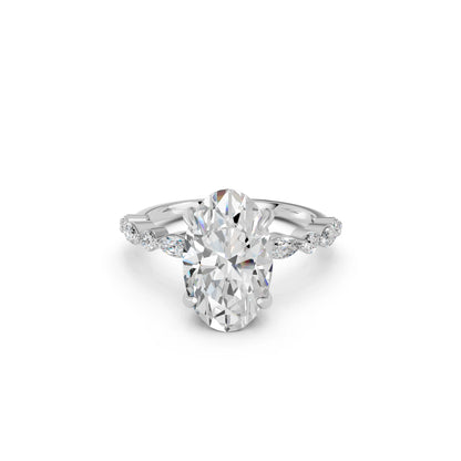 OVAL ENGAGEMENT RING WITH MQ/RD SIDE STONE