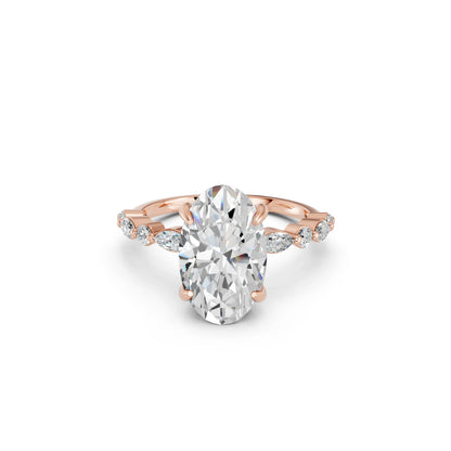 OVAL ENGAGEMENT RING WITH MQ/RD SIDE STONE