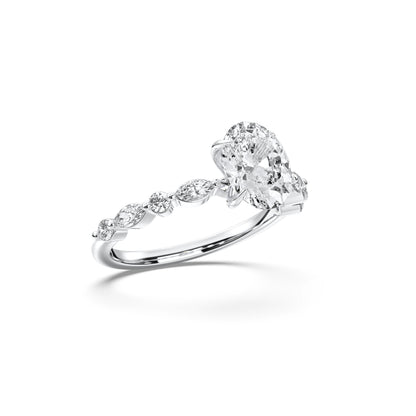 OVAL ENGAGEMENT RING WITH MQ/RD SIDE STONE