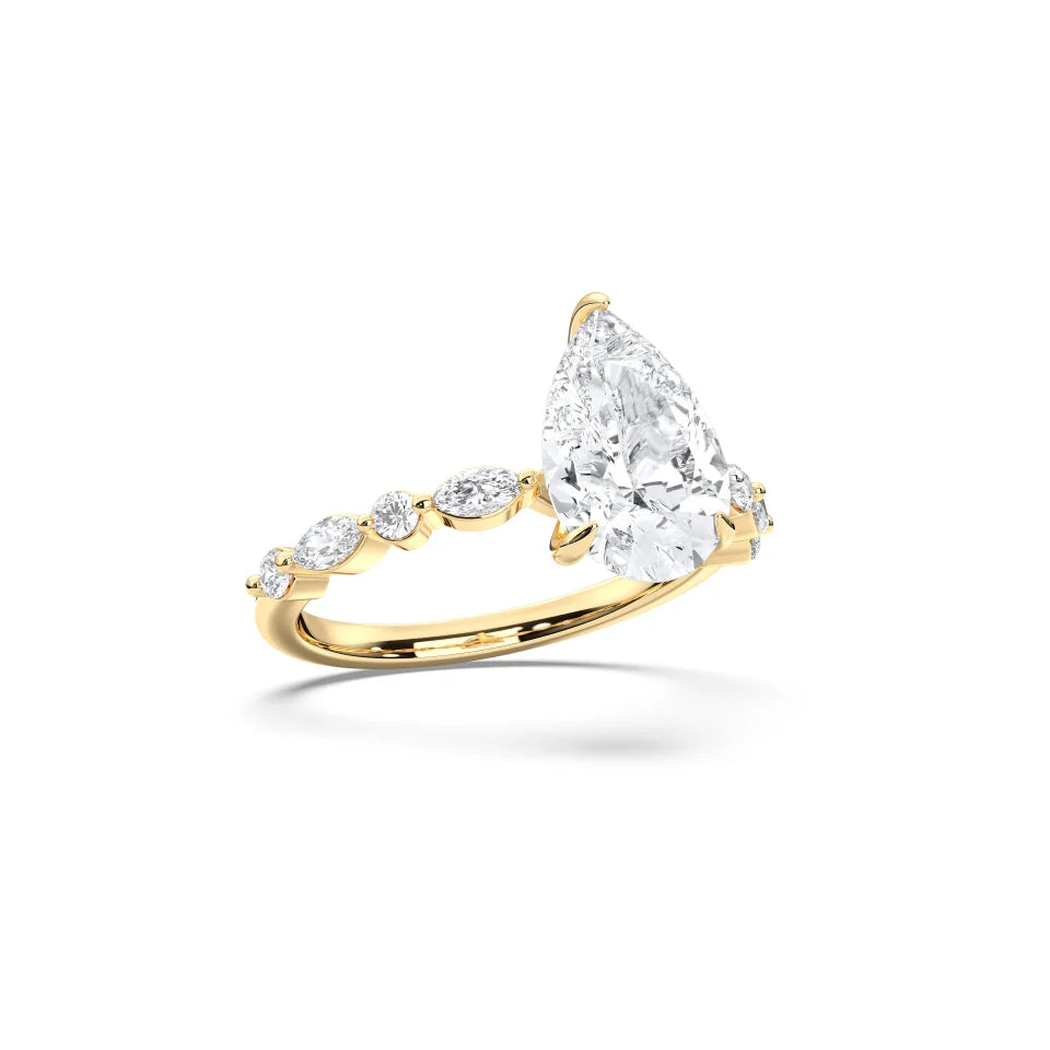 PEAR ENGAGEMENT RING WITH MQ/RD SIDE STONE