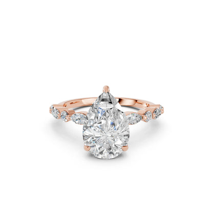 PEAR ENGAGEMENT RING WITH MQ/RD SIDE STONE