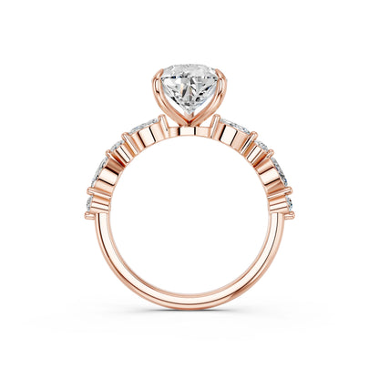 PEAR ENGAGEMENT RING WITH MQ/RD SIDE STONE