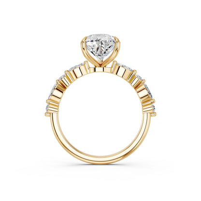 PEAR ENGAGEMENT RING WITH MQ/RD SIDE STONE