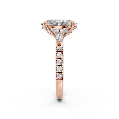 OVAL ENGAGEMENT RING WITH FLORAL SIDE CLUSTERS