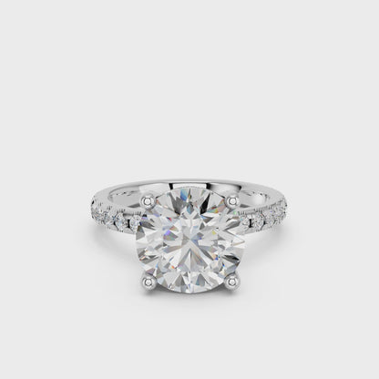 ROUND HIDDEN HALO WITH SIDE STONE PAVE BAND RING